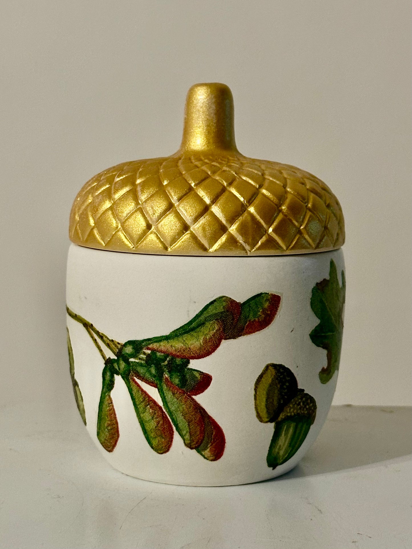 Ceramic acorn pot with gold lid